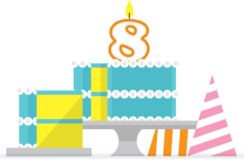 Number 8 candle on top of a cartoon cake